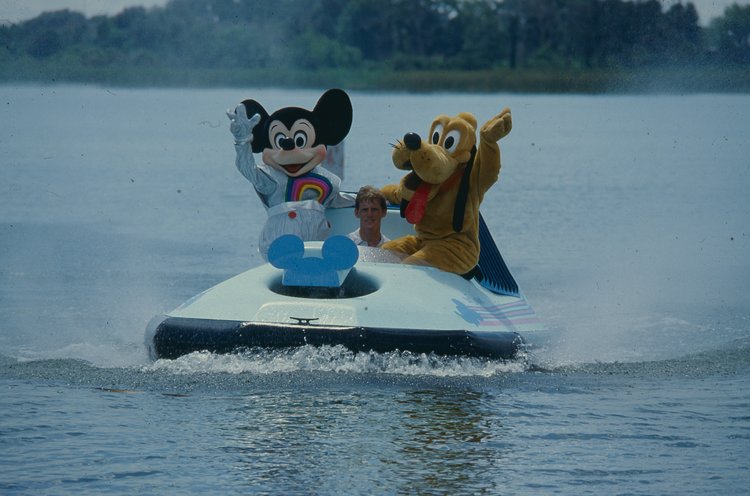 1985 Mickey and Goofy Operating a Neoteric LeMere Craft to Promote Disney's Epcot Hovercraft Dragon Show.